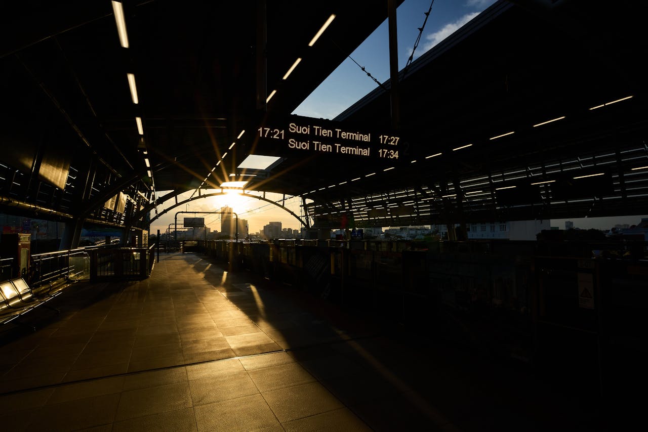 Features sunset-at-suoi-tien-terminal-railway-station-34065810